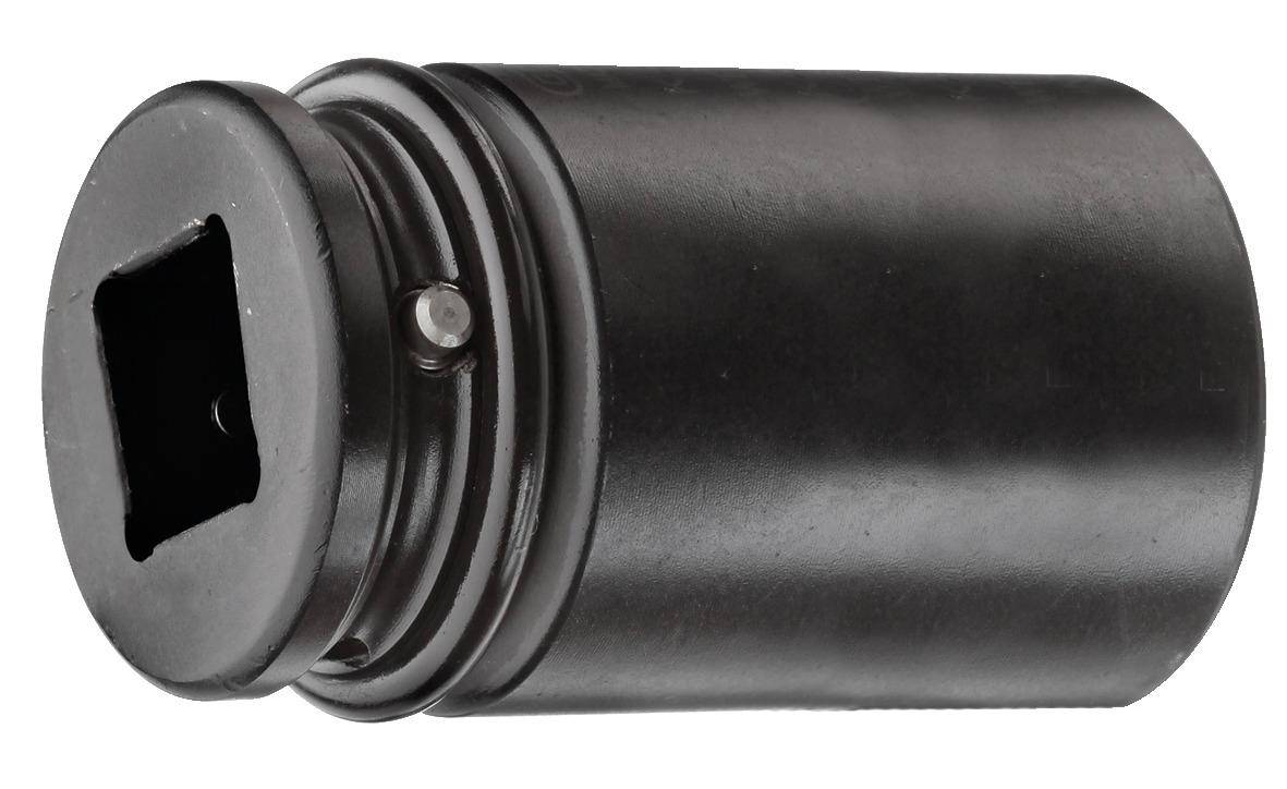 Ein Nahaufnahmebild eines schwarzen zylindrischen Objekts mit einem kleinen Metallstift, der an der Seite sichtbar ist, möglicherweise Teil eines mechanischen Geräts.