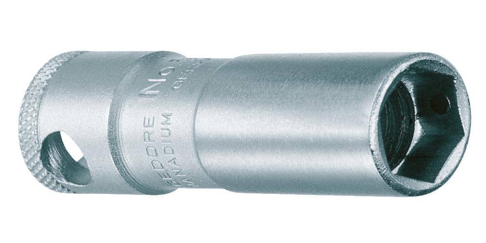 Nahaufnahme eines metallischen Zylinders mit schwach eingraviertem Text, der auf 