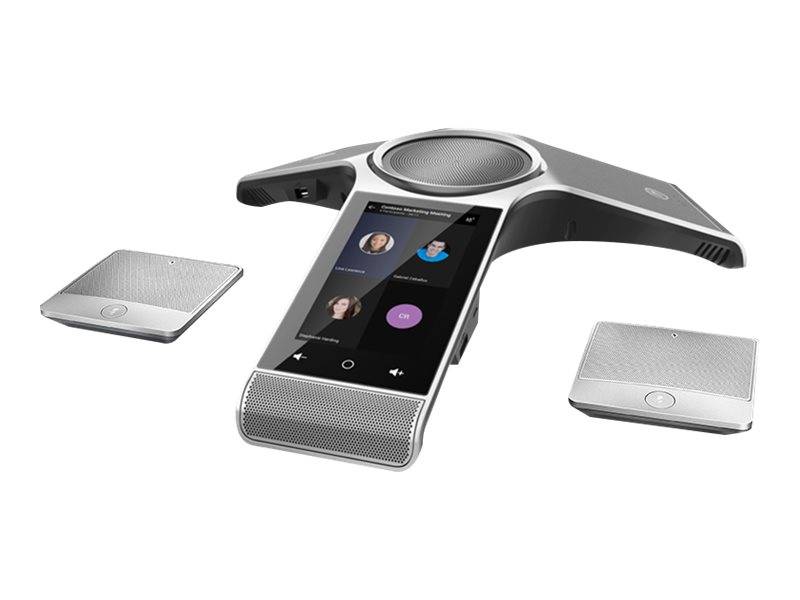 Konferenzfreisprechanlage mit Touchscreen-Display und zwei abnehmbaren kabellosen Mikrofonpods auf weißem Hintergrund.