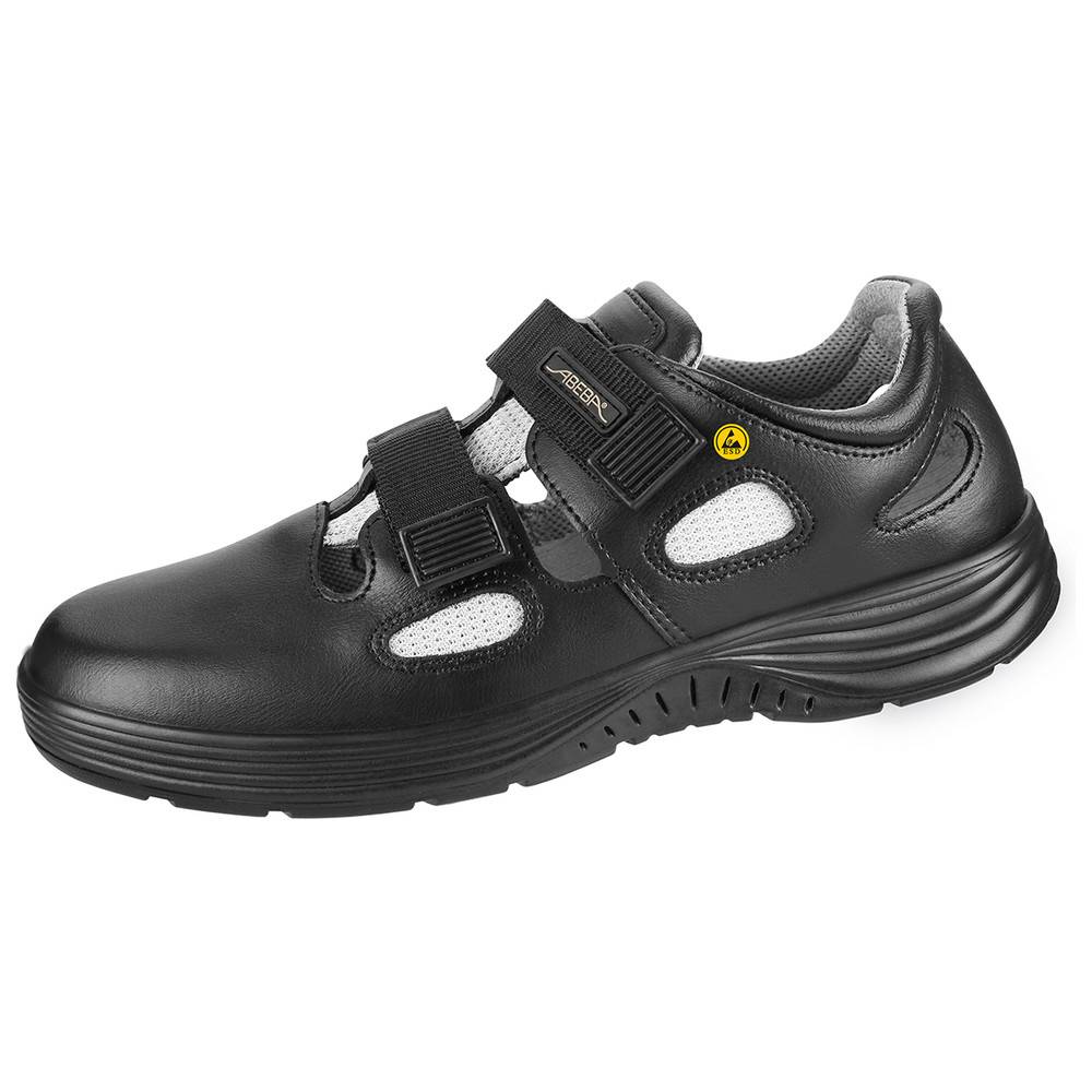 Schwarze orthopädische Sandale mit verstellbaren Klettverschlüssen, gedämpfter Sohle und Netz-Ausschnitten für Atmungsaktivität, entwickelt für Komfort und Unterstützung.