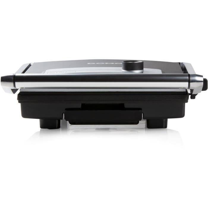 Vorderansicht eines geschlossenen schwarzen elektrischen Grills oder einer Sandwichpresse mit silbernem Deckel und einem Bedienknopf oben, isoliert auf weißem Hintergrund.