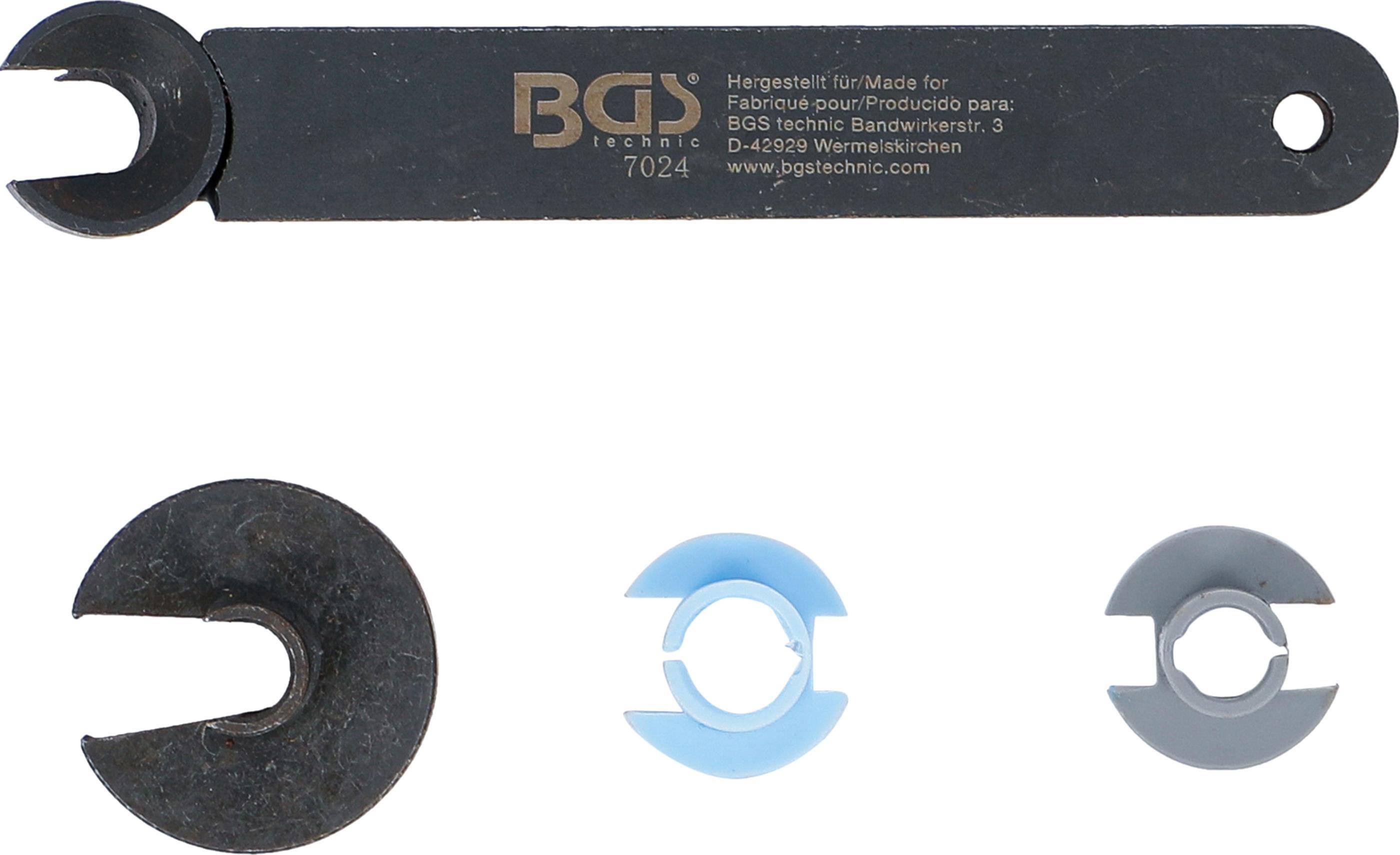 BGS 7024' Branding auf einer schwarzen Oberfläche mit drei kreisförmigen Gegenständen darunter: eine schwarze Schleifscheibe, ein blauer Abstandshalter und eine Kuppelscheibe.