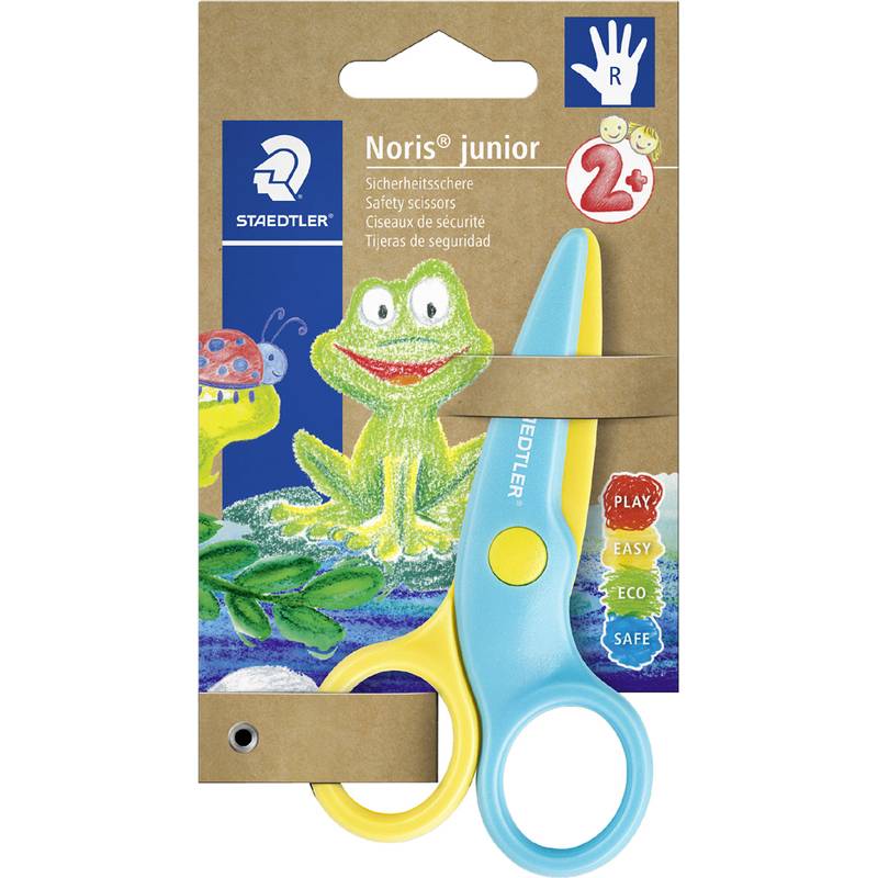 Ein verpacktes Paar Kindersicherheitsscheren in Blau und Gelb. Die Verpackung zeigt einen Cartoon-Frosch und Sicherheitssymbole wie ‚SICHER' und ‚EINFACH'.