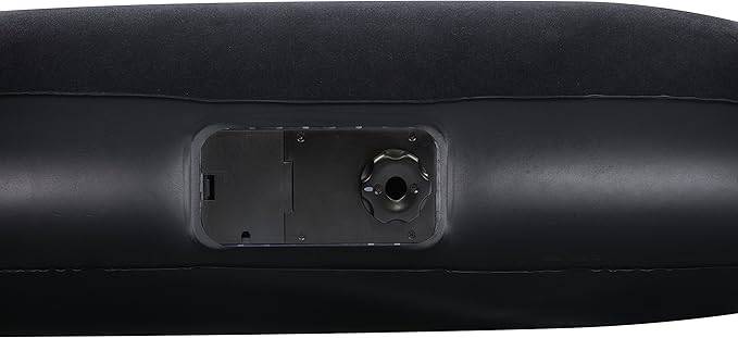Schwarze Lederarmstütze mit eingebautem Fach und Drehreglerschalter, von oben dargestellt.