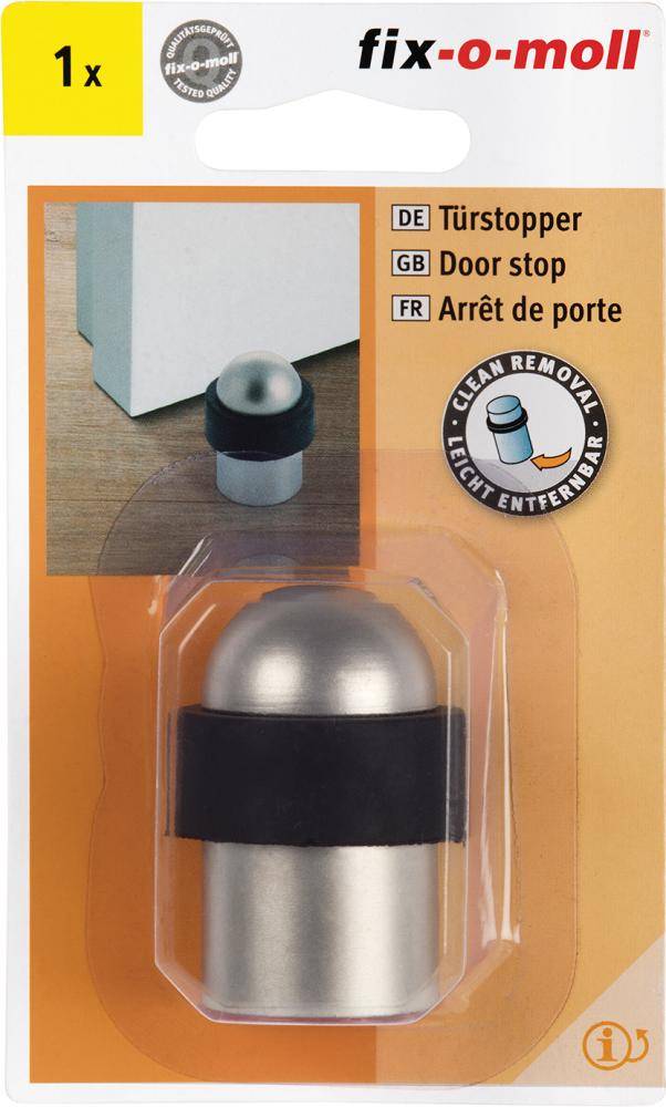 Packung eines fix-o-moll Türstopper, das einen silber-schwarzen bodenmontieren Stopper und Etikettentext in Deutsch, Englisch und Französisch zeigt.