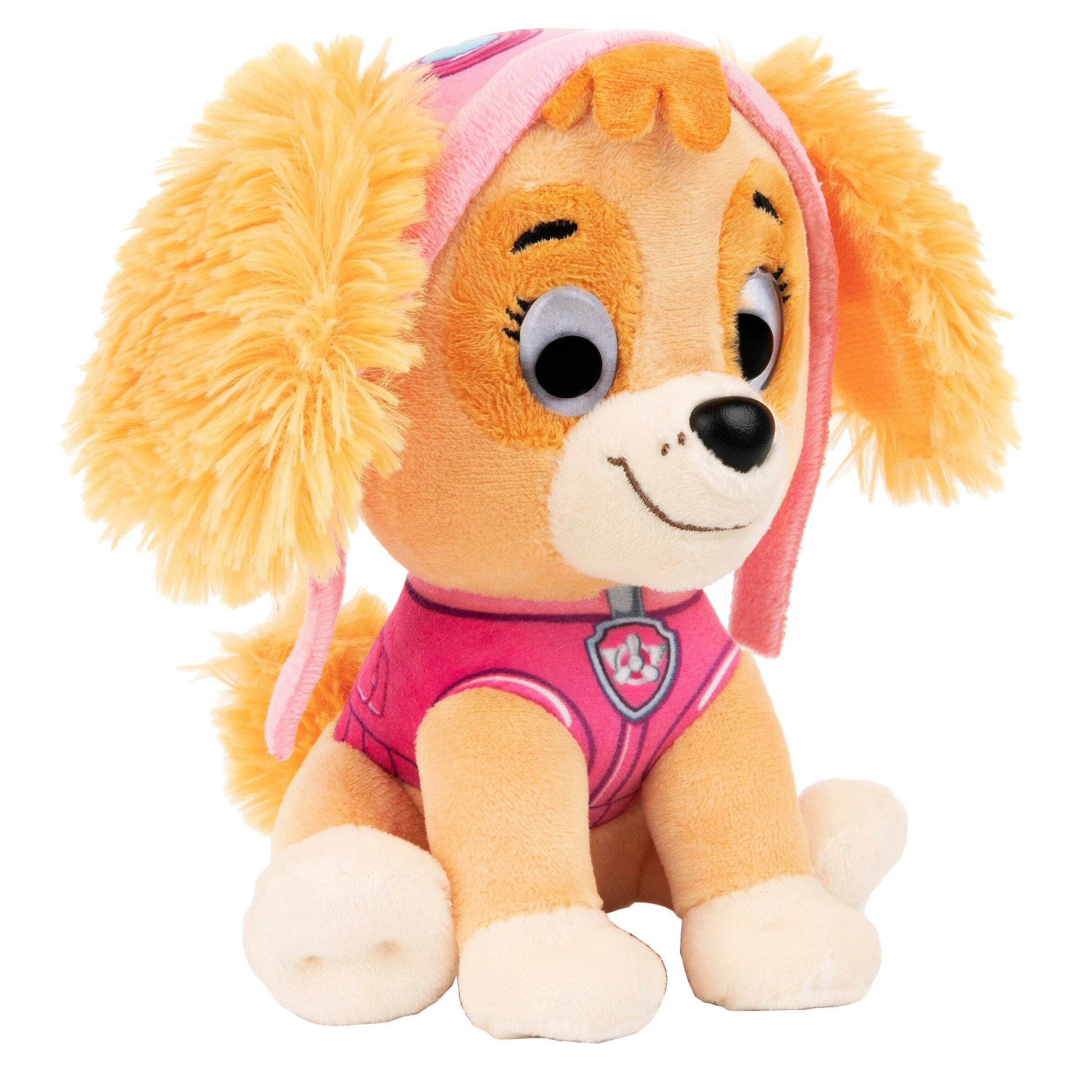 Ein kuscheliges Cartoon-Hundchen mit schlappigen gelben Ohren, das ein rosafarbenes Outfit und einen Hut trägt, sitzt frontal auf weißem Hintergrund.