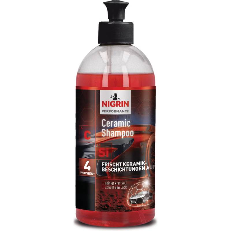 Eine rote Flasche Nigrin Performance Ceramic Shampoo, gekennzeichnet zur Auffrischung von Keramikbeschichtungen und Reinigung von Lackoberflächen für vier Wochen.
