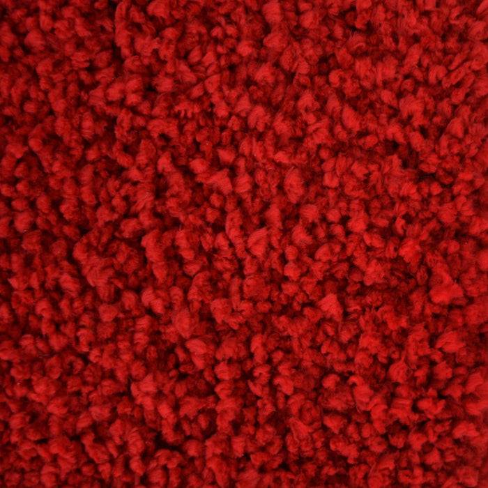 Nahaufnahme eines strukturierten roten Teppichs mit einem üppigen, weichen Flor.