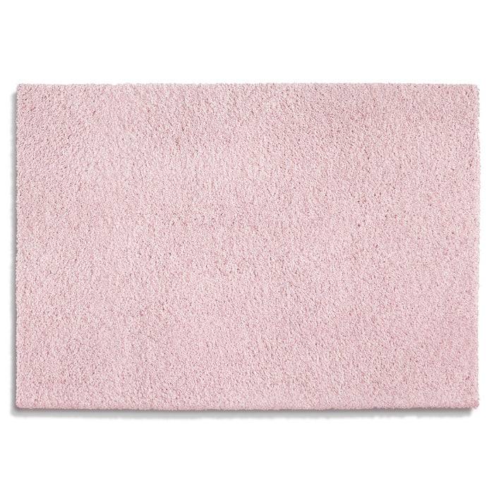 Ein rechteckiger, weicher rosa Badvorleger mit einer plüschigen Textur, geeignet für die Verwendung im Badezimmer.