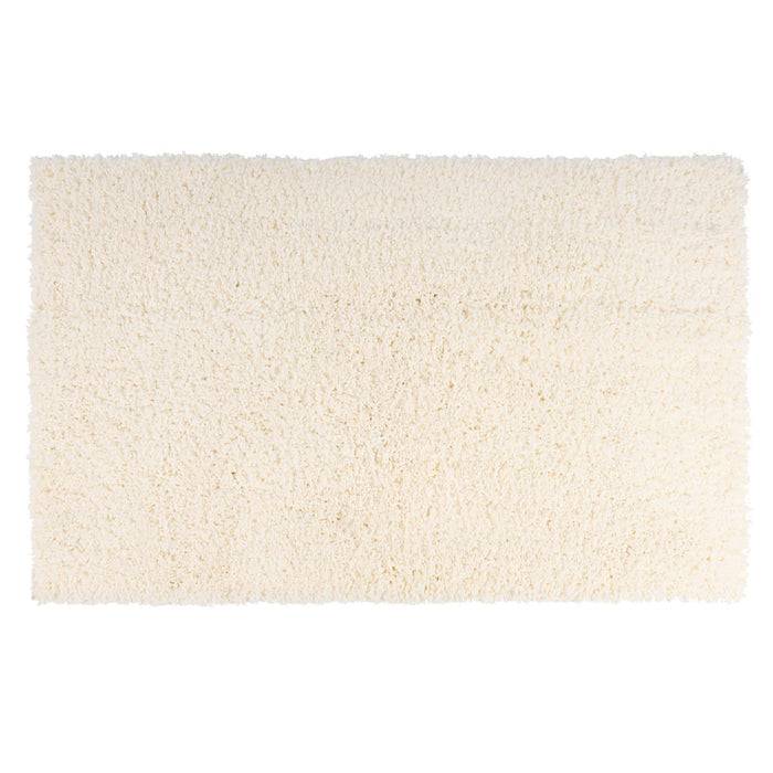 Ein weißer, rechteckiger, zottiger Teppich mit weicher Textur füllt den Rahmen.