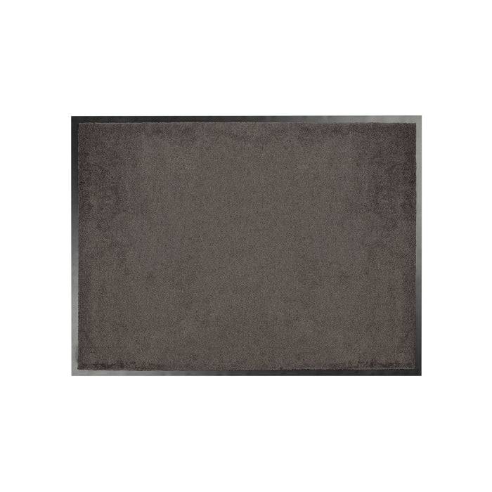 Eine schlichte, rechteckige, dunkelgraue Matte mit schwarzen Kanten auf hellgrauem Hintergrund.