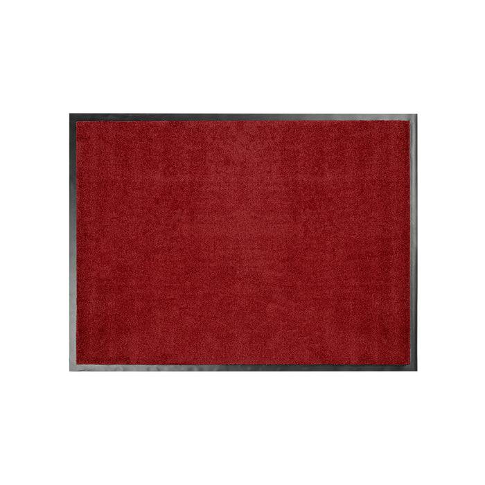 Ein einfacher roter rechteckiger Teppich mit schwarzem Rand.
