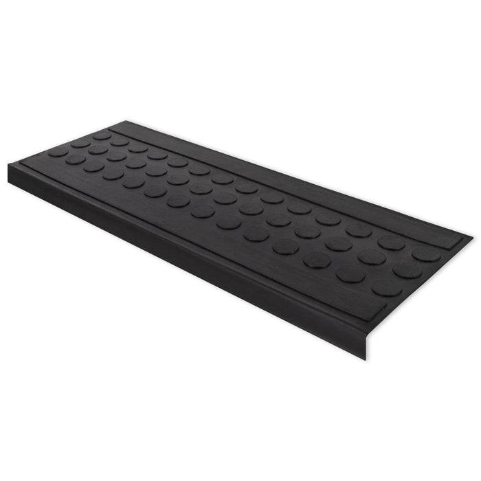 Schwarze Gummischwelle mit Rampendesign und strukturiertem kreisförmigem Muster, entwickelt um Barrierefreiheit bei kleineren Höhenunterschieden zu gewährleisten.