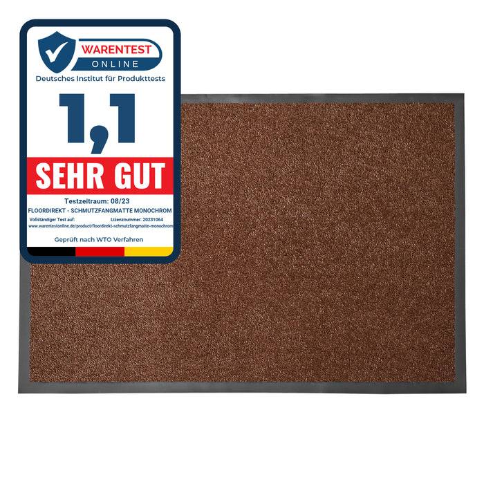 Eine Rolle schwarzen Teppichs mit glatter Oberfläche, die seine Dicke und Langlebigkeit hervorhebt.