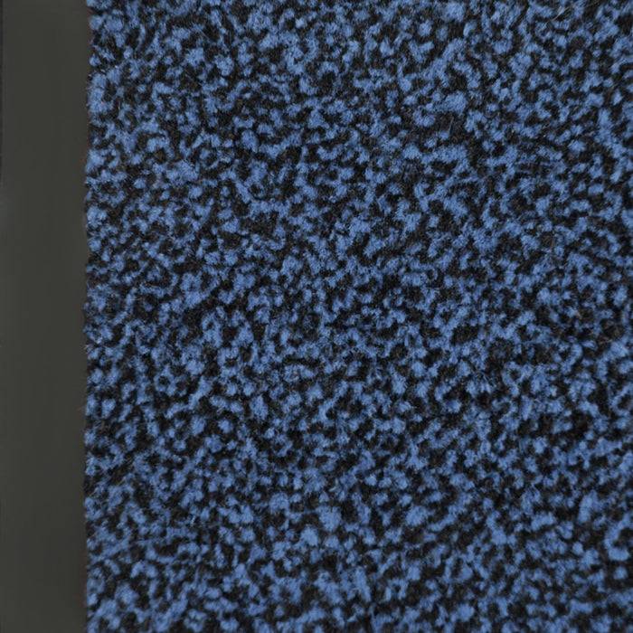 Eine Nahaufnahme einer strukturierten blauen und schwarzen gesprenkelten Oberfläche mit einem vertikalen schwarzen Streifen auf der linken Seite.
