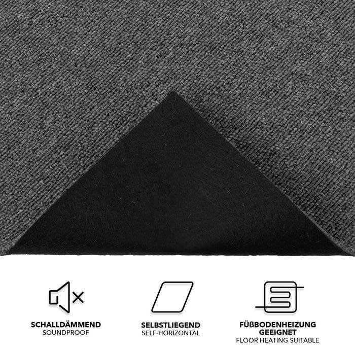 Ein dunkelgraues rechteckiges Teppichmuster mit umgeklappter Ecke, die eine schwarze Unterseite zeigt. Texticon darunter lesen: „Schalldämmend