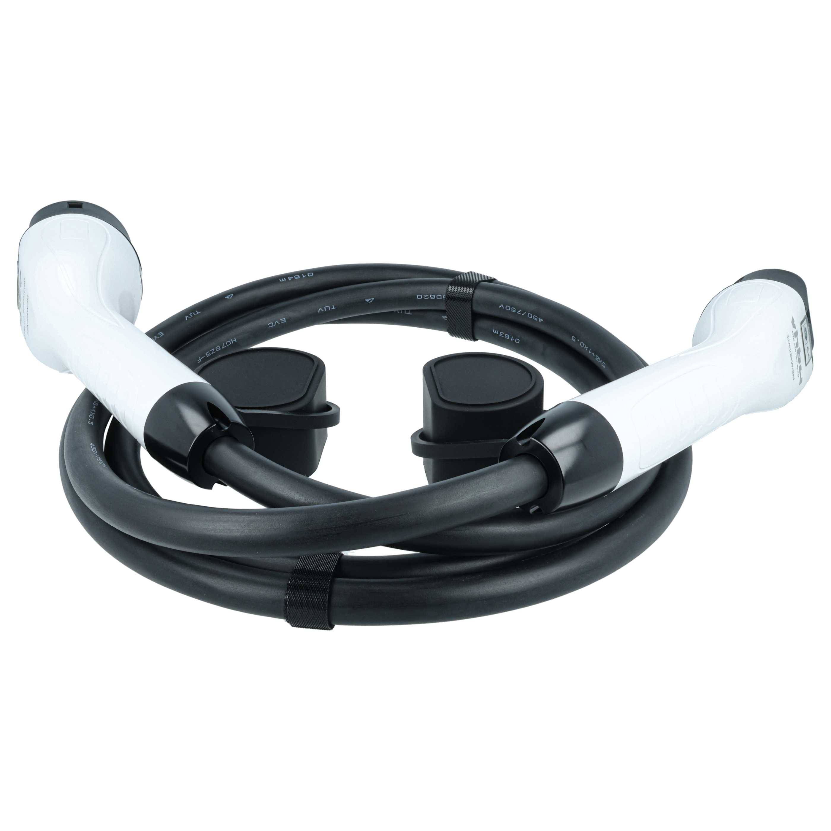 Aufgerolltes schwarzes Elektrofahrzeug-Ladekabel mit weißen Steckern an beiden Enden.