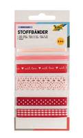 Dekorative Stoffbänder-Set mit verschiedenen Mustern und Botschaften, darunter 'mit Liebe', in rosa, weiß und rot.