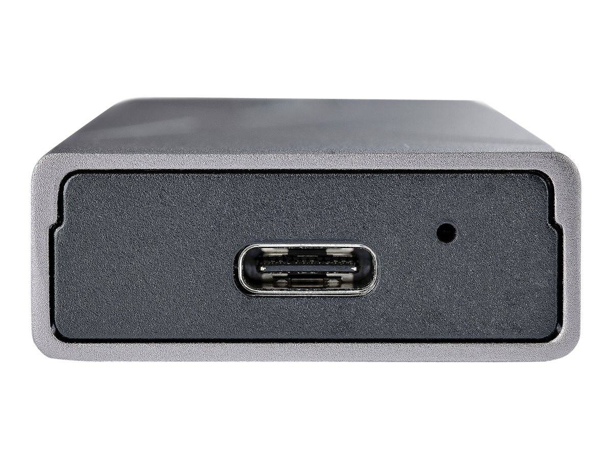 Nahaufnahme eines kleinen schwarzen rechteckigen Geräts mit einem USB-C-Anschluss an der Vorderseite und einem kleinen Anzeigeloch.