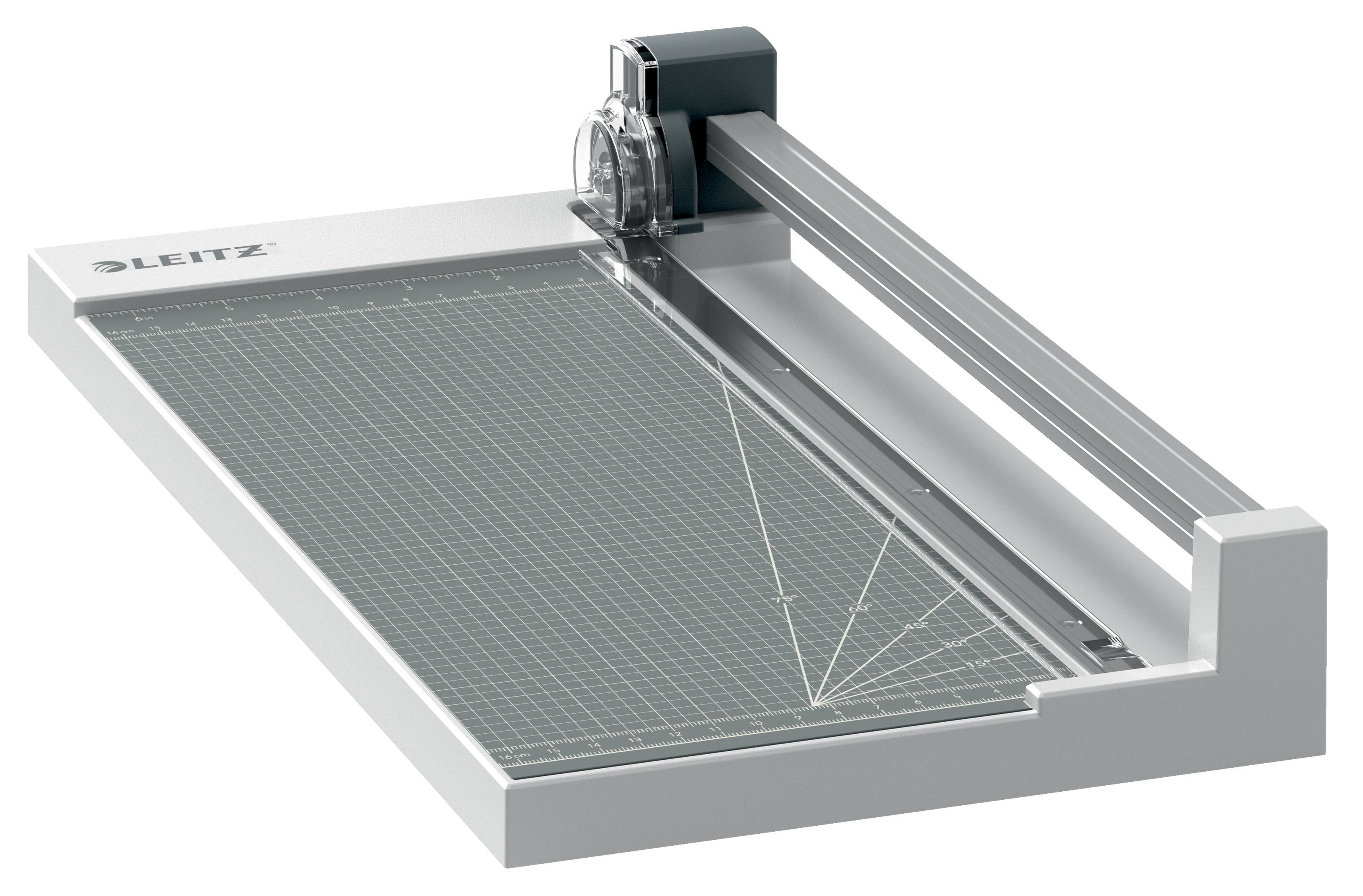 Papierschneider/Guillotinen-Trimmer mit Schneidematte mit Raster und Gleitklinge, in schräger Ansicht auf schwarzem Hintergrund dargestellt.