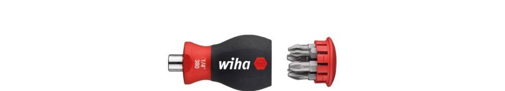 Wiha Wechselgriff-Schraubendreher mit rot-schwarzem Griff, gezeigt mit abnehmbarem Bithalter und separat abgelösten Bits auf der rechten Seite.