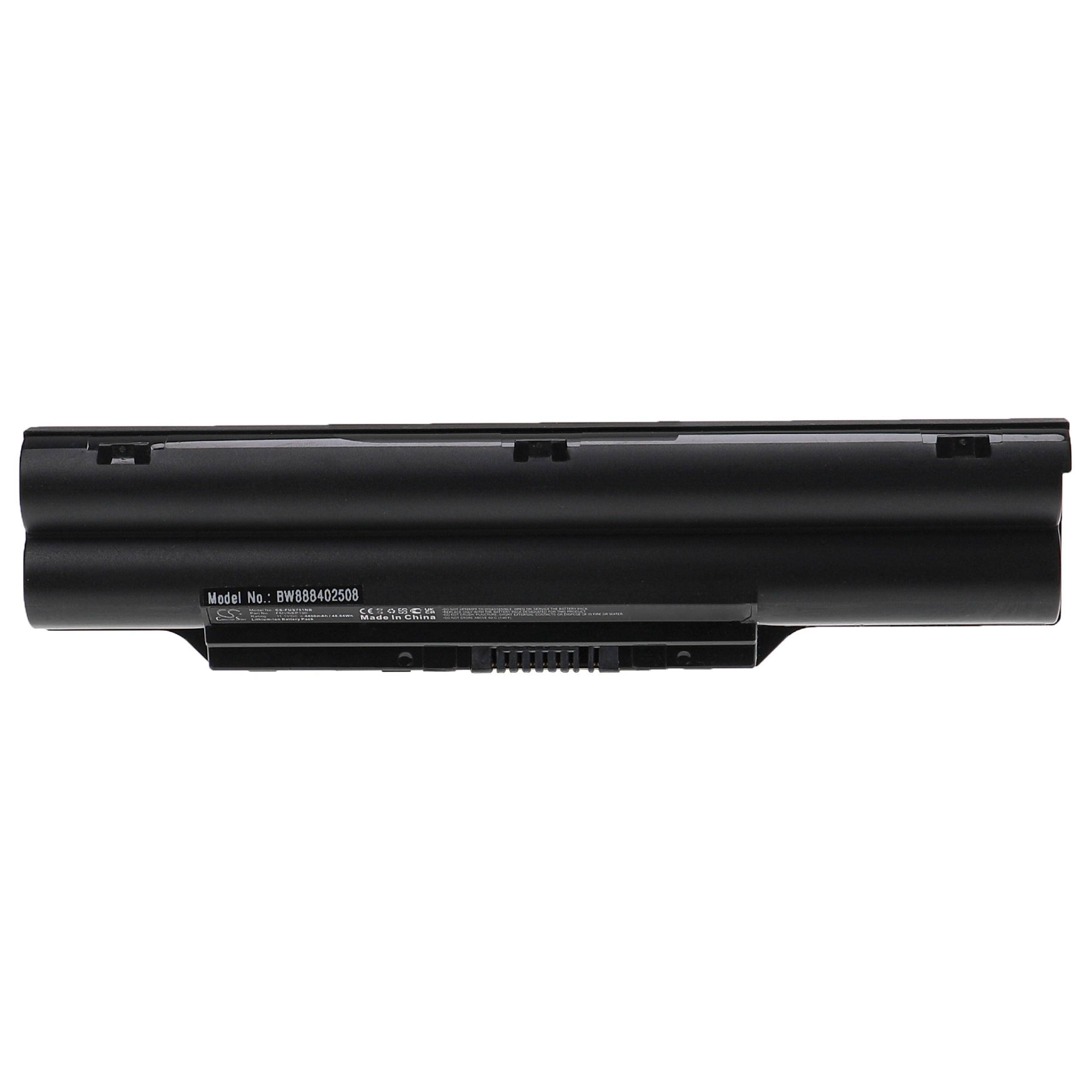 Eine schwarze Laptop-Batterie mit der auf ihr aufgedruckten Modellnummer 