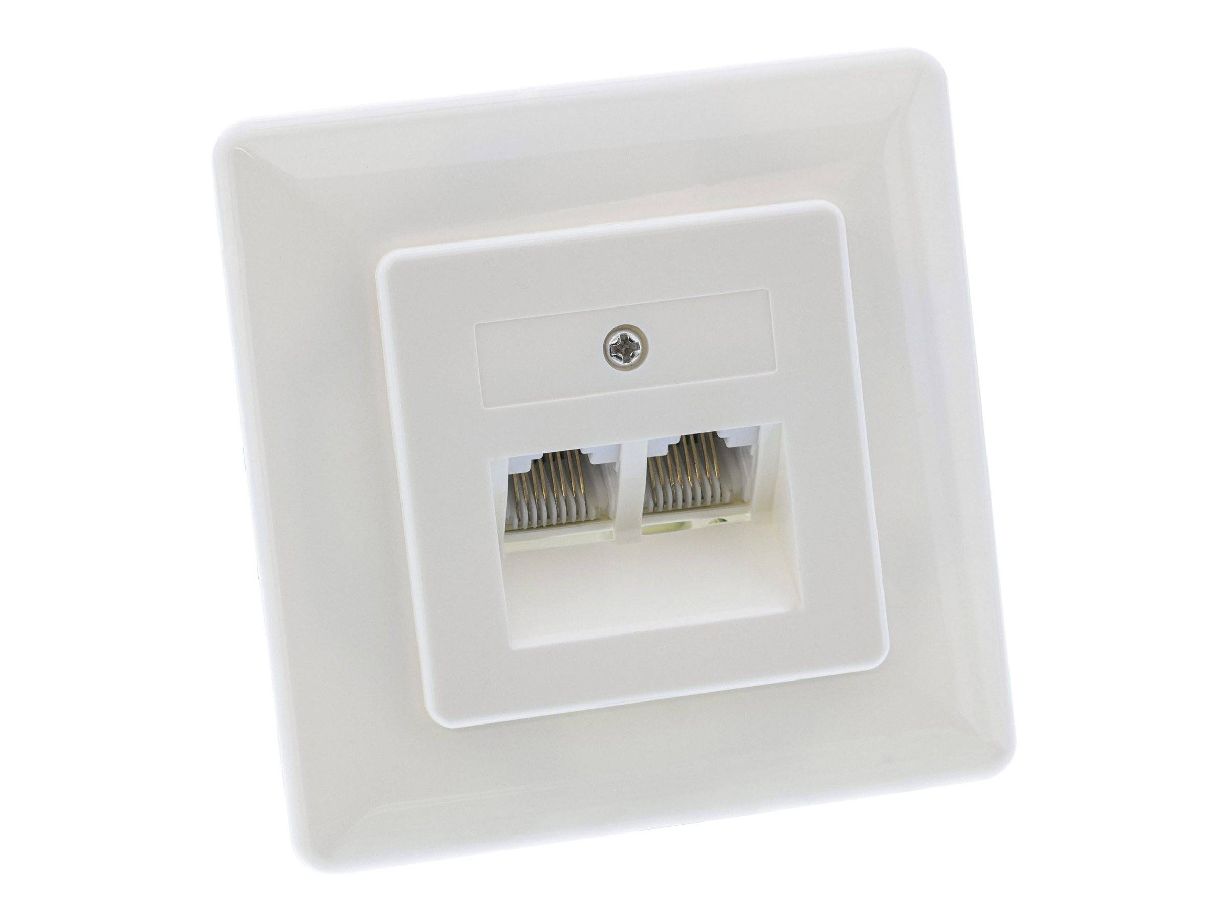 Weiße wandmontierte Ethernet-/Datendose mit zwei Anschlüssen und einer zentralen Schraube auf neutralem Hintergrund.
