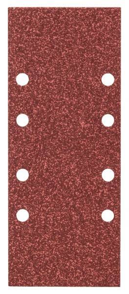 Schleifpapier-Blatt mit mehreren gleichmäßig verteilten Löchern auf einer groben, rötlich-braunen Oberfläche, das zum Glätten oder Polieren von Materialien verwendet wird.