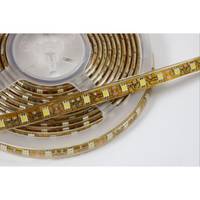 Aufgerollte flexible LED-Streifen auf einer Rolle, mit gelben LED-Chips auf einem goldfarbenen Streifen.