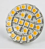 Nahaufnahme eines runden LED-Leuchtmoduls mit mehreren gelben Dioden, die in konzentrischen Ringen auf einer silbernen Leiterplatte angeordnet sind.