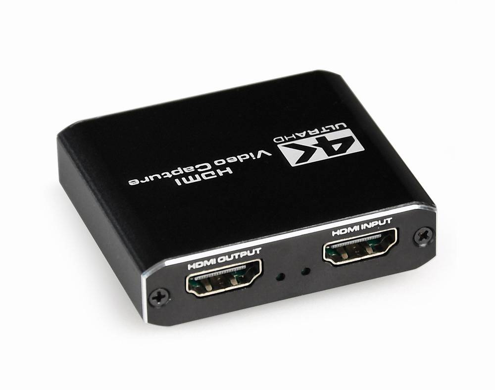 Schwarzes HDMI-Videoerfassungsgerät mit HDMI-Ein- und Ausgangsanschlüssen auf der Vorderseite.