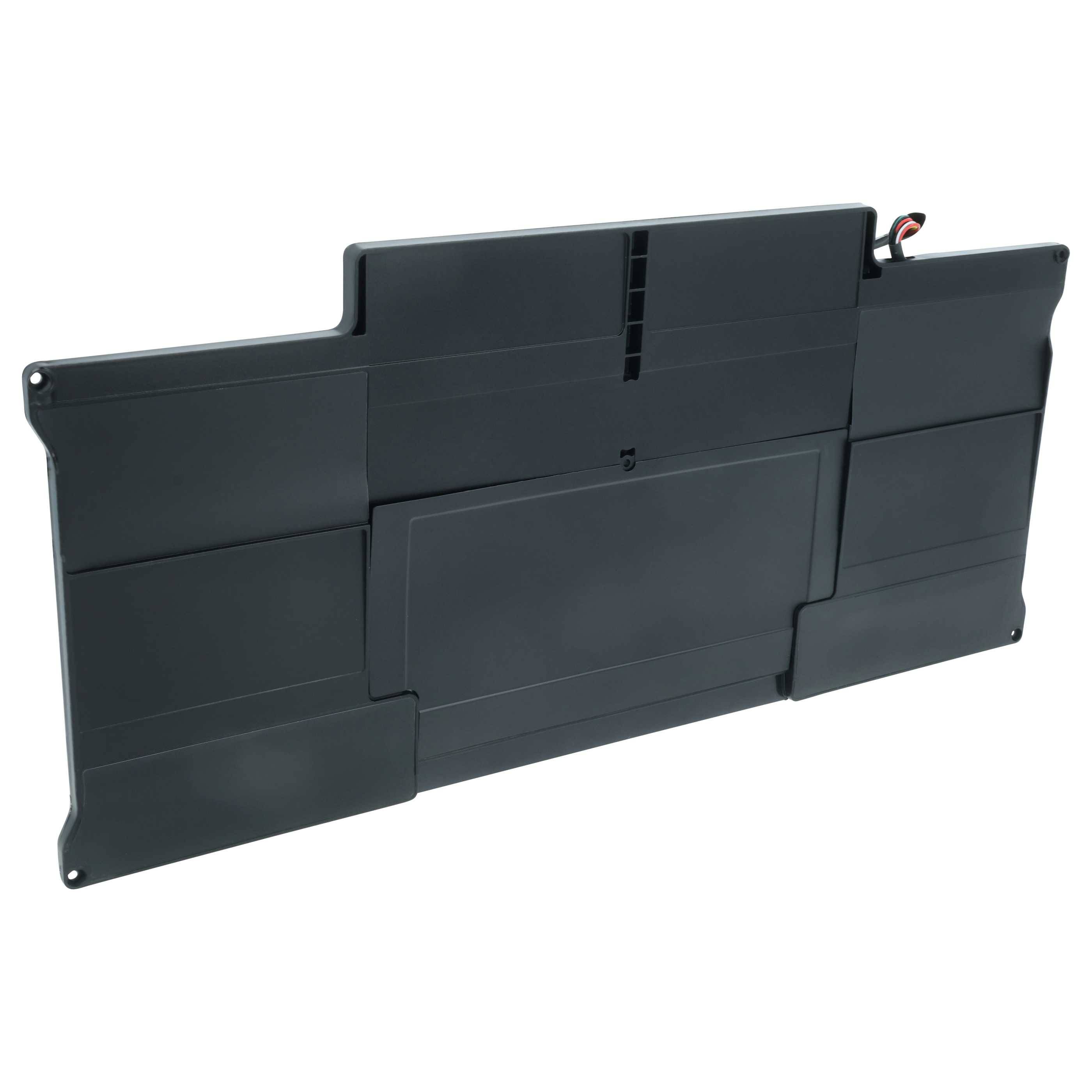 Eine flache, rechteckige schwarze Laptop-Batterie mit einer leicht unebenen Form, die einen kleinen Anschlussdrakt in der oberen rechten Ecke aufweist.