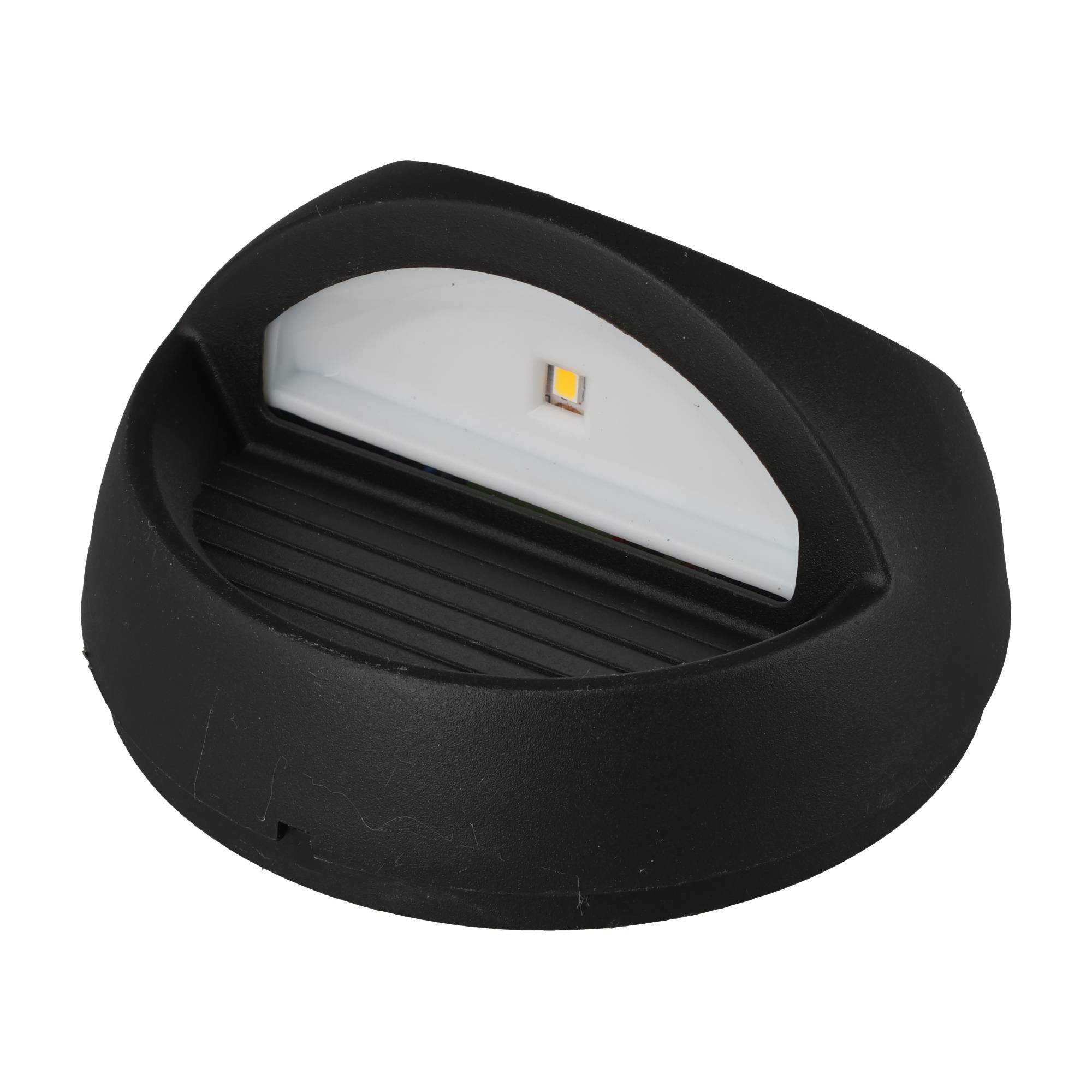 Schwarze ovale LED-Wandleuchte mit weißem Diffusor und einzelnem sichtbaren LED-Chip, gezeigt auf einfachem Hintergrund.