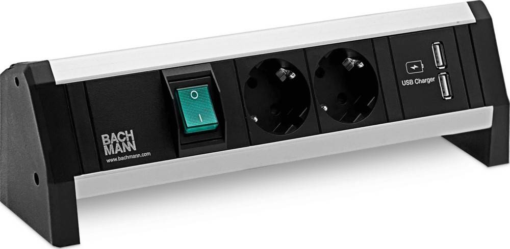 Eine Steckdosenleiste mit einem grünen Ein/Aus-Schalter und zwei europäischen Steckdosen.