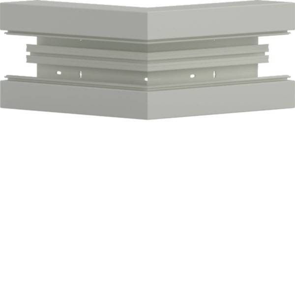 Deckenecke mit geschichteten quadratischen Zierprofilen in modernem Design, die eine dezente hellgraue Farbgebung aufweisen.