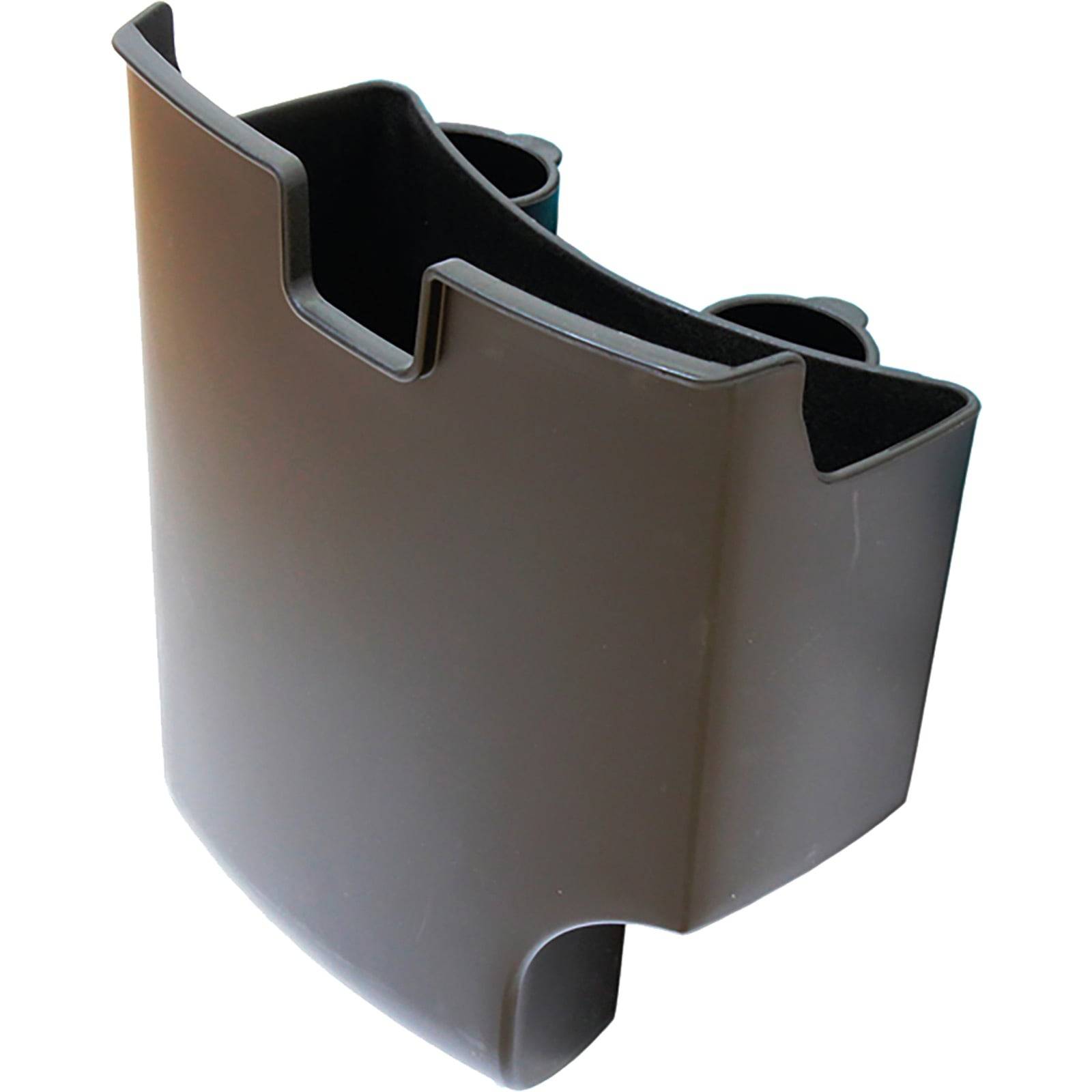 Eine braune Plastikabdeckung, wahrscheinlich für elektrischen oder strukturellen Schutz, mit zwei Schlitzen und glatten Kanten.