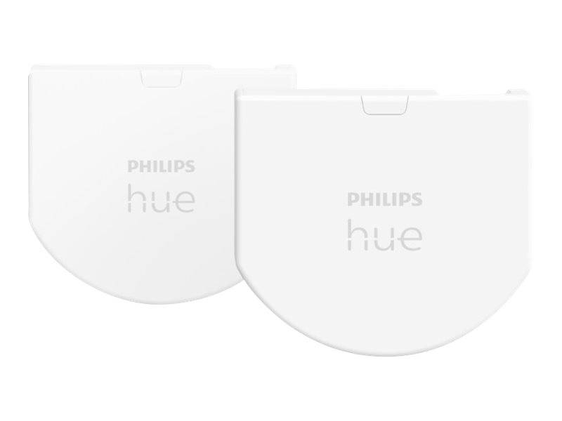 Zwei weiße kreisförmige Philips Hue-Geräte oder Abdeckungen, nebeneinander auf einem einfachen Hintergrund dargestellt.