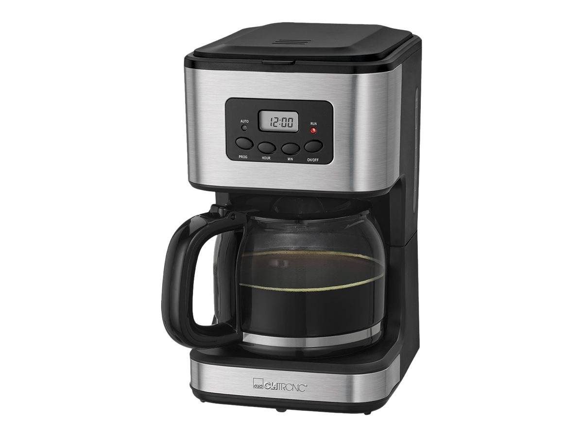 Elektrische Tropfkaffeemaschine mit Edelstahl-Finish, digitaler Anzeige, die 12:00 zeigt, und einer vollständigen Glaskanne auf einem schwarzen Sockel.