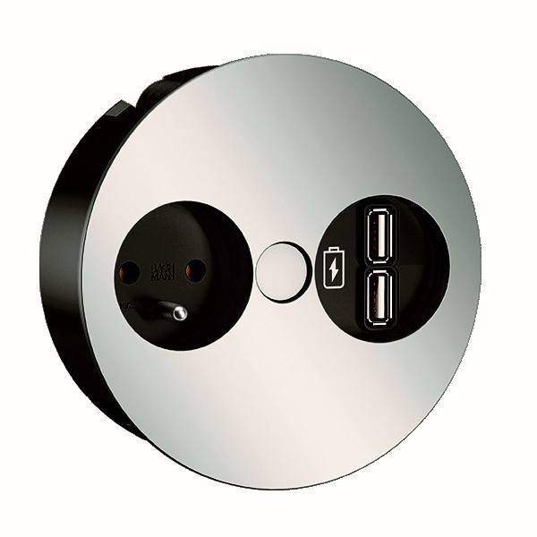 Eine kreisförmige Wandsteckdose mit einer Standard-Europäischen Steckdose und zwei USB-Ladeanschlüssen. Der USB-Bereich zeigt ein Ladessymbol.