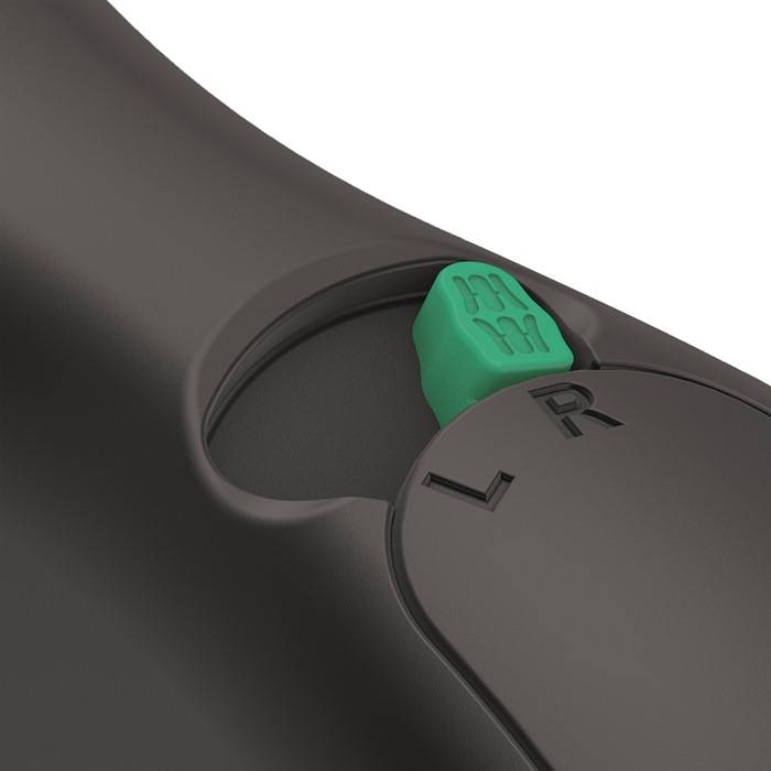 Nahaufnahme eines schwarzen Geräts mit einem großen Knopf mit der Beschriftung „L