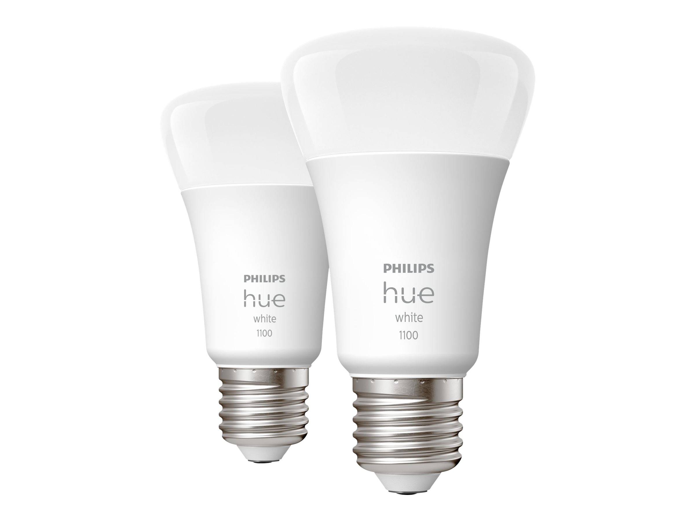 Zwei nebeneinander angeordnete Philips Hue weiße LED-Lampen, eine Standard-Lampe und eine größere Flutlicht-Lampe.