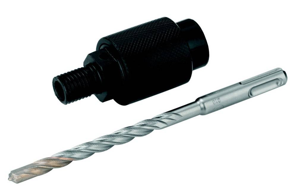 Eine Nahaufnahme eines schwarzen Bohrfutters, das an einem metallischen Bohrer befestigt ist und zum Festziehen und Sichern des Bohrers in einer Bohrmaschine verwendet wird.