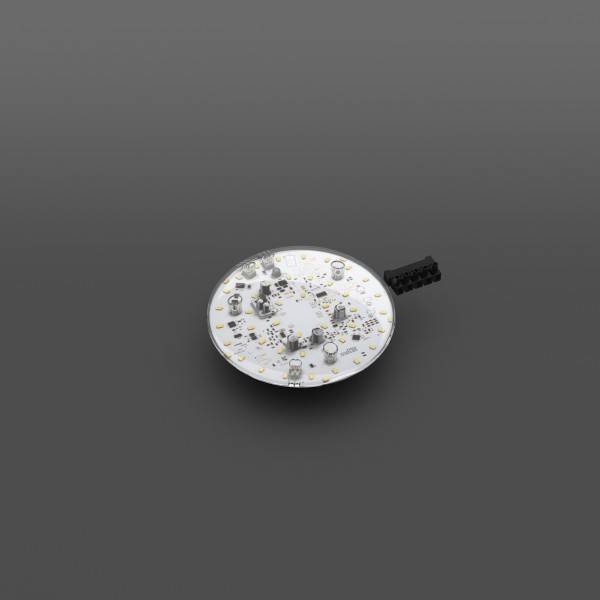 Kleine runde weiße LED-Platine mit mehreren oberflächenmontierten Komponenten und schwarzem Stecker auf grauem Hintergrund.