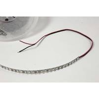 Ein flexibles LED-Lichtband mit roten und schwarzen Verbindungskabeln, aufgerollt auf einer weißen Oberfläche.