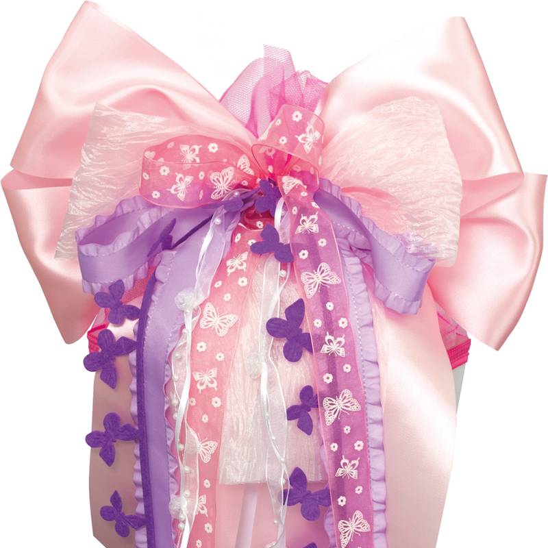 Eine große, dekorative Schleife aus rosa, lila und weißen Bändern mit Schmetterlingsmuster, die häufig für besondere Anlässe oder Geschenke verwendet wird.