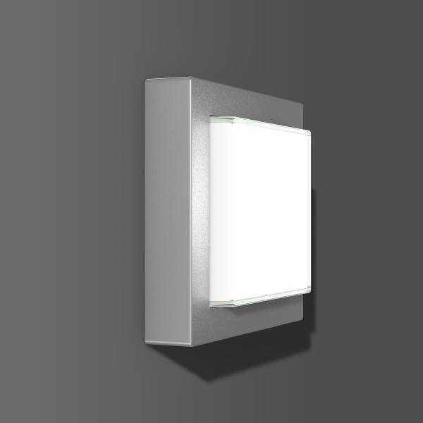 Modernes rechteckiges Wandleuchten-Element mit einem weiß beleuchteten vorderen Panel auf grauem Hintergrund.