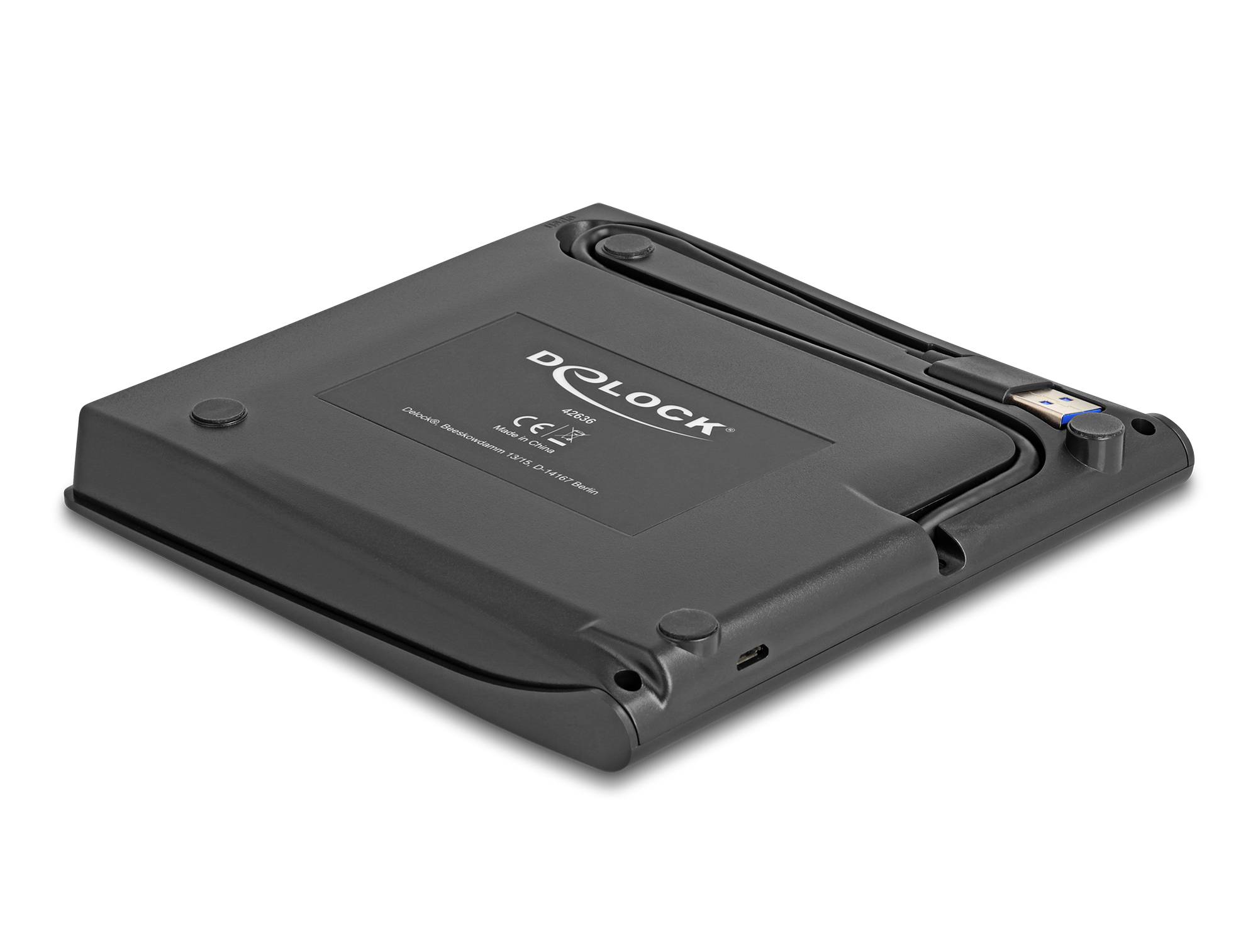 Schwarzes Delock externes Festplattengehäuse von unten gezeigt, mit sichtbarem USB-Anschluss und Schiebevorrichtung.
