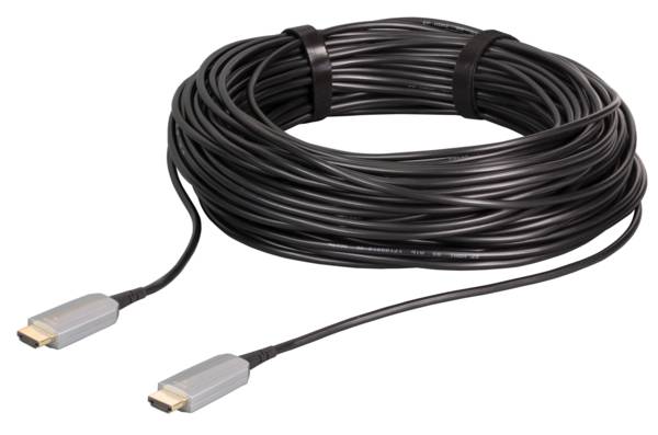 „Ein gewickeltes HDMI-Kabel mit Metallsteckern an beiden Enden, entwickelt für die Übertragung von hochauflösenden Video- und Audiosignalen.