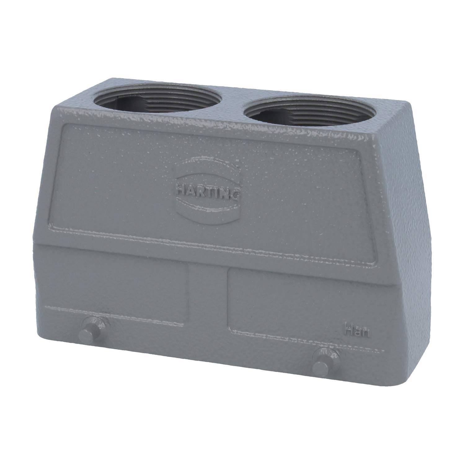 Ein grauer metallischer rechteckiger Steckverbindungsgehäuse mit zwei kreisförmigen Öffnungen oben und dem Wort 