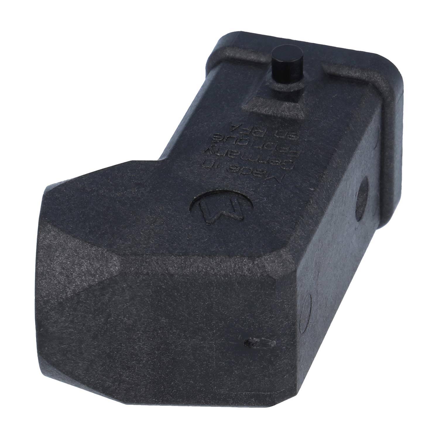 Ein schwarzes rechteckiges Industrieteil mit leicht geneigter Oberseite, das ein erhabenes Pfeilsymbol und Zahlen aufweist.